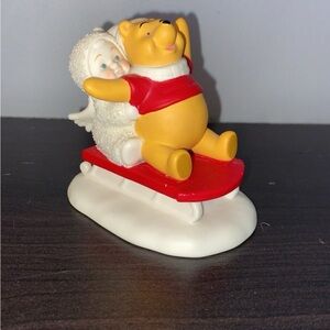 Sledding with Pooh Snowbabies